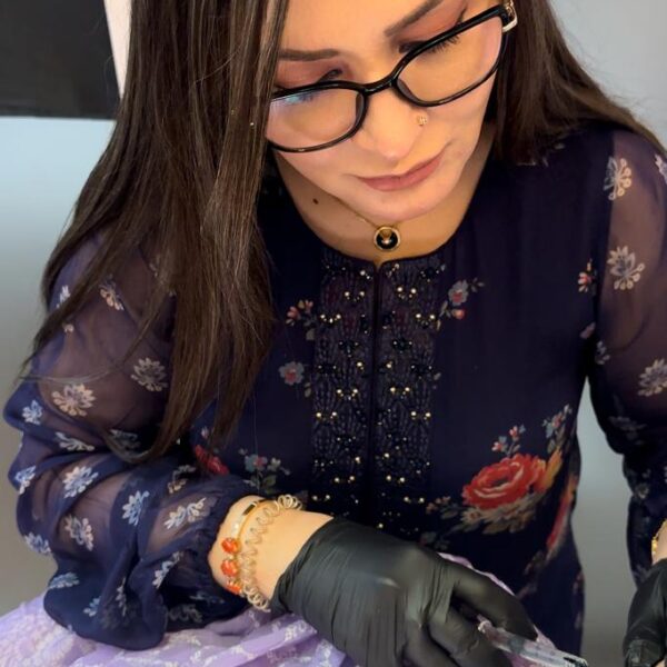 Best dermatologist in Islamabad, Dr. Shumaila Khan during fillers treatment